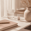 Kina NAD+ vial on desk — focus and clarity lifestyle