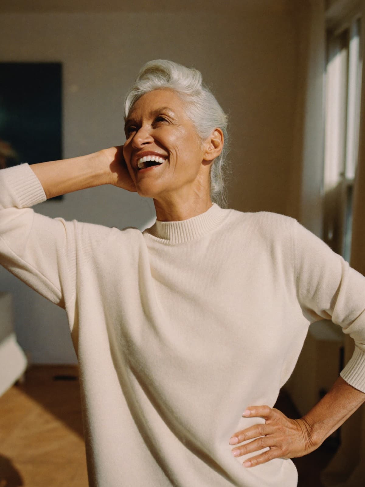 Woman feeling energized and clear in warm morning light